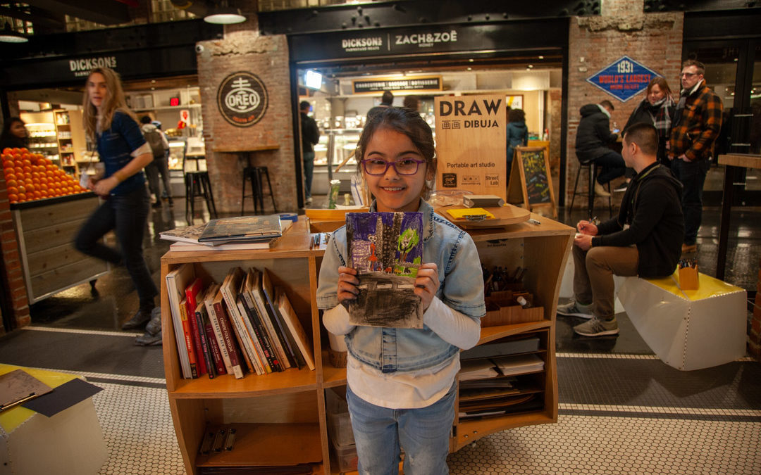 Pop-up drawing studio in Chelsea Market on a winter afternoon